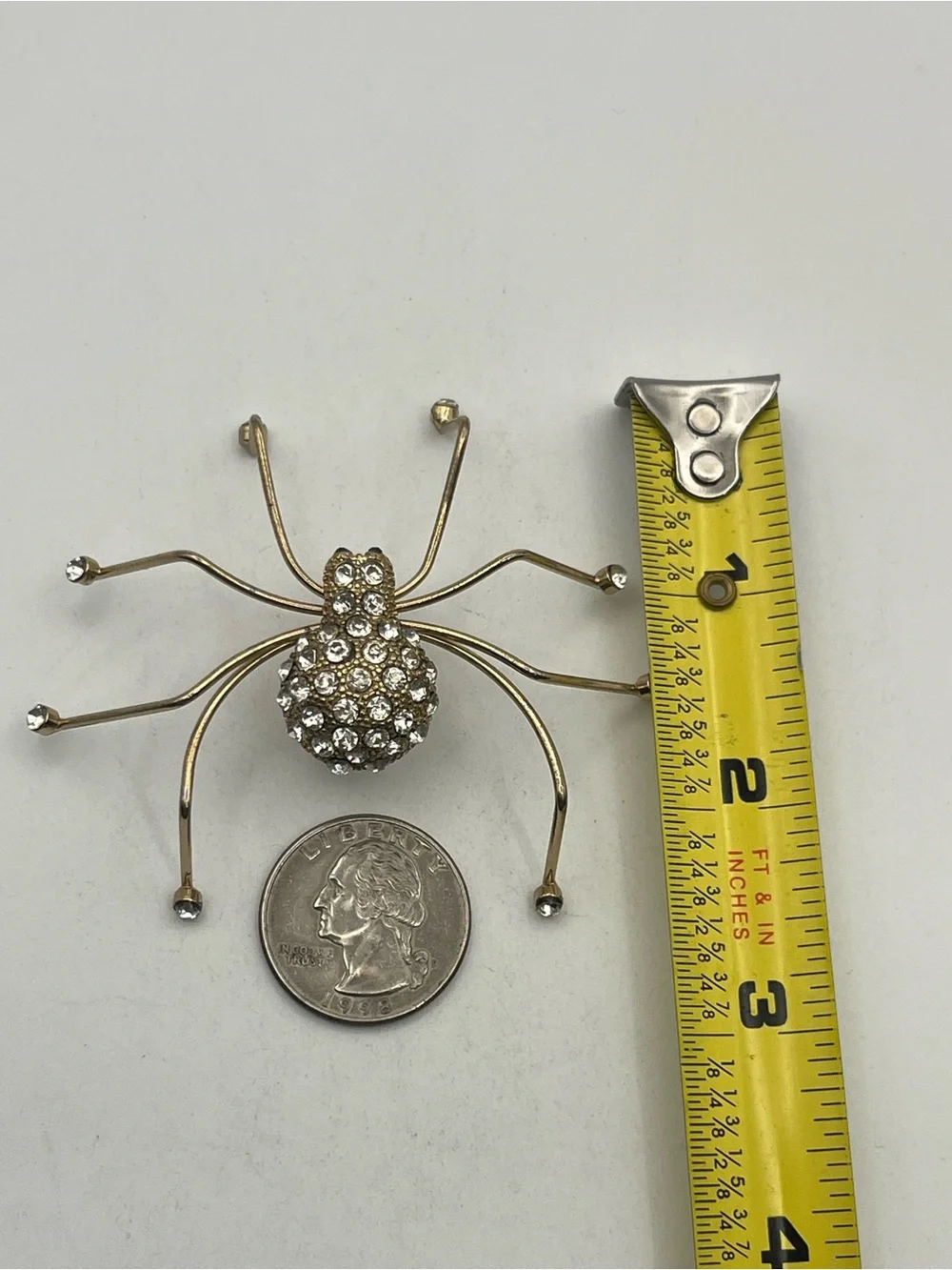 Spider insect gold tone clear rhinestone brooch pin